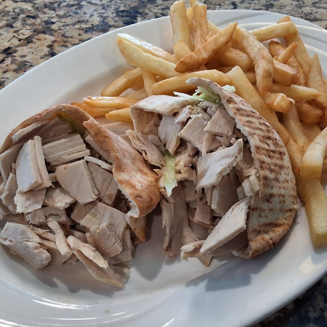 Fresh Breast of Turkey Pita Sandwich.