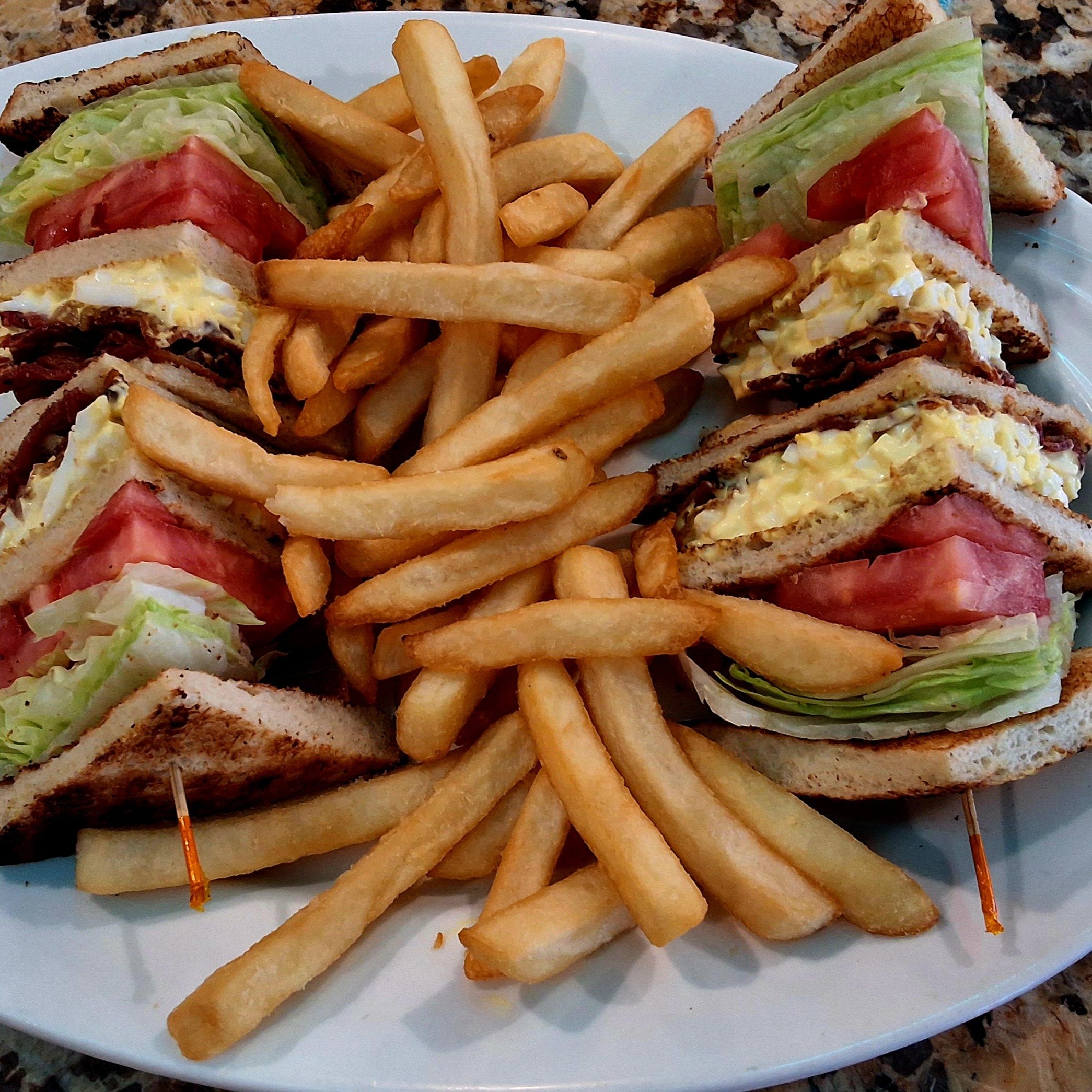 Egg Salad and Bacon Club Sandwich.